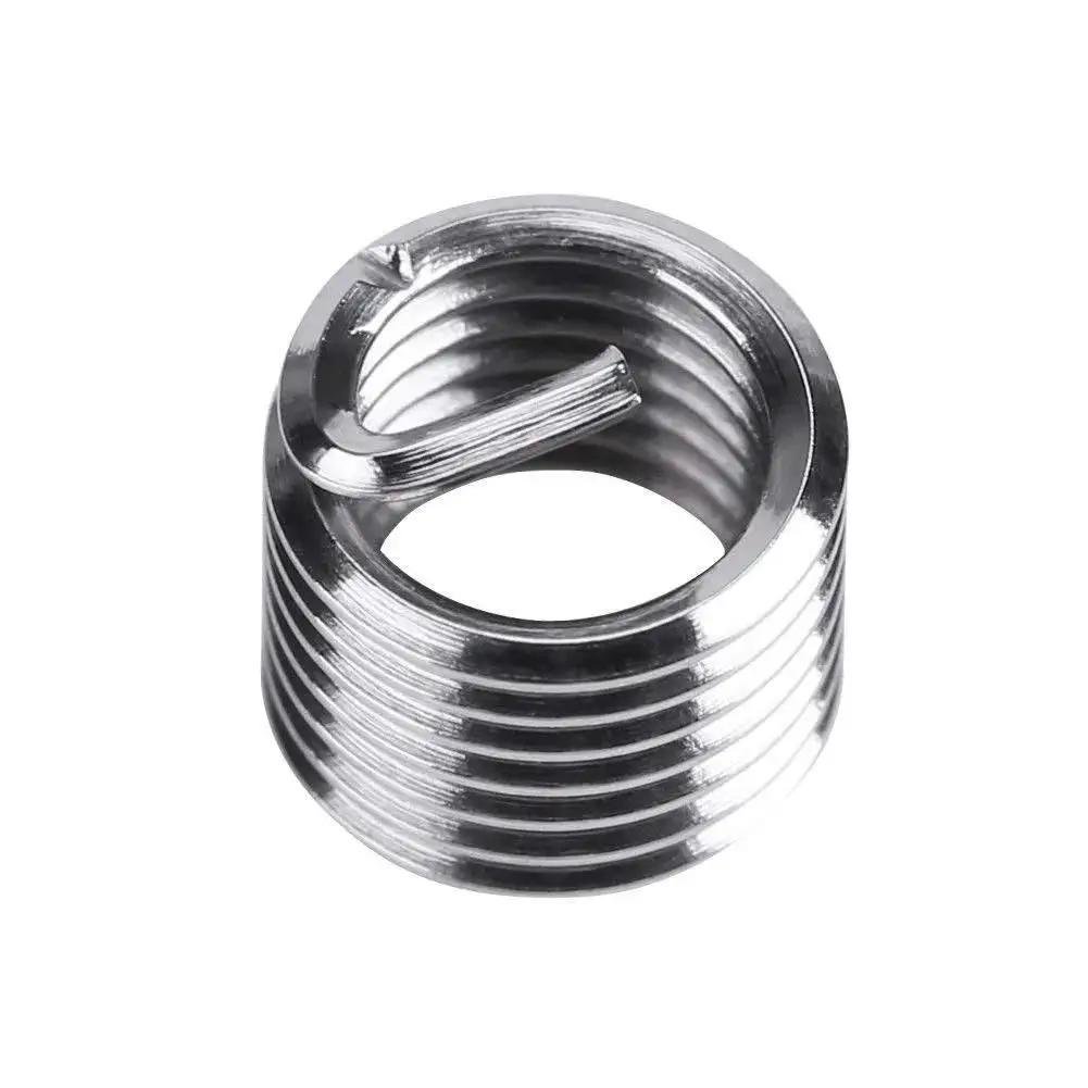 Close-up of a stainless steel insert from Stainless 35 Piece Thread Repair Kit M6 X 1mm Insert Set For Auto Repairs And Quick Fixes