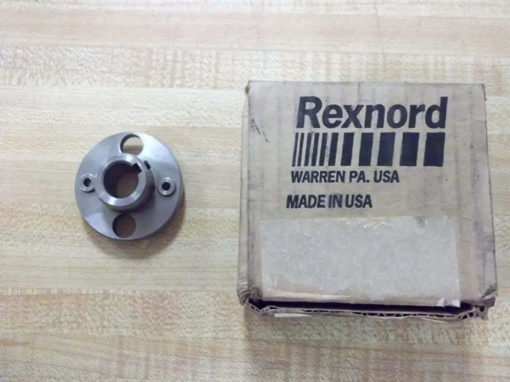 DBZ 50 RB 5/8 Inch Hub 514401 For Rexnord System next to packaging, steel bearing hub for conveyor and gear drive component.
