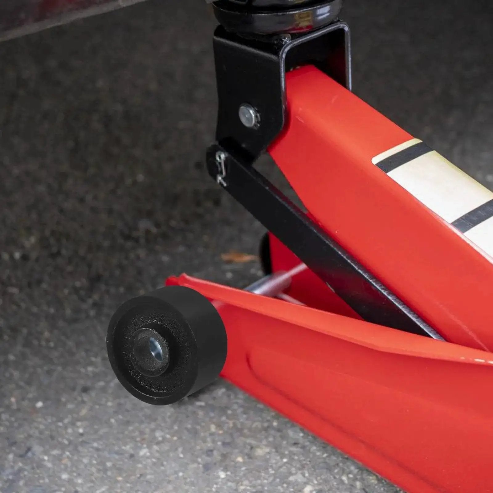 Universal Steel Front Wheel Replacement For Hydraulic Floor Jacks 2.5 Ton To 3.5 Ton installed on red hydraulic jack