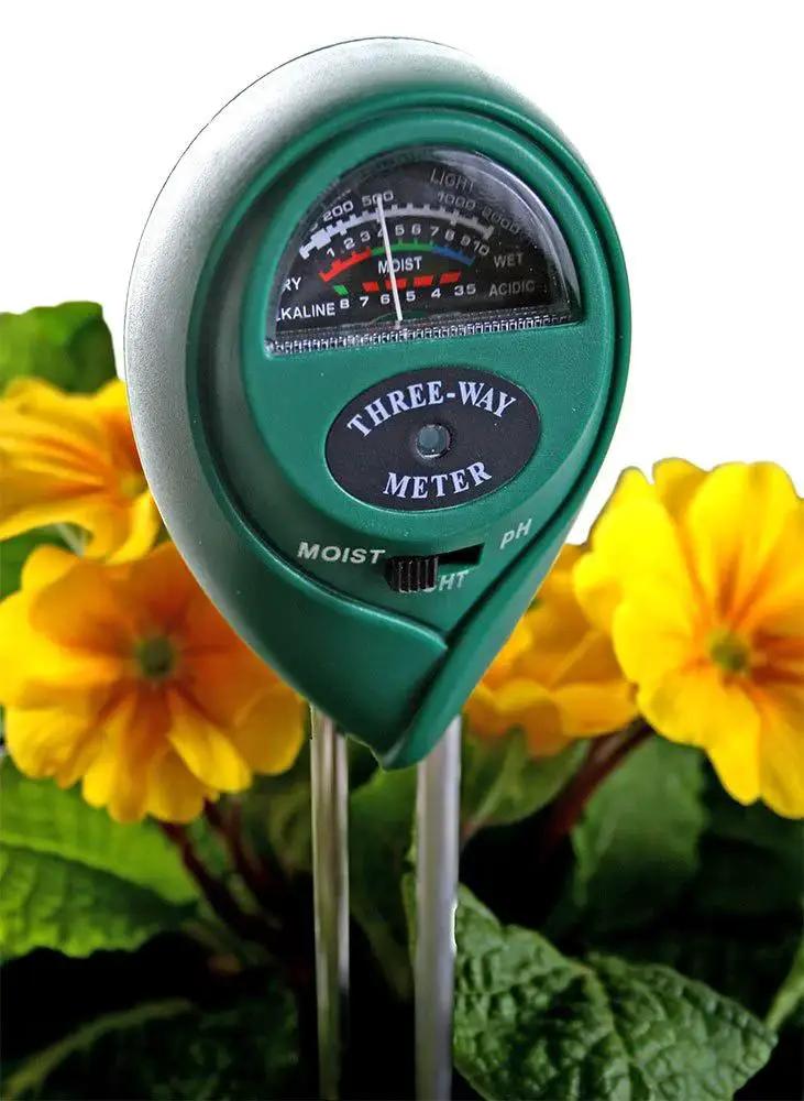 ActiveAir 3 Way PH Light And Moisture Meter for Indoor And Outdoor Gardens, showing readings surrounded by flowers