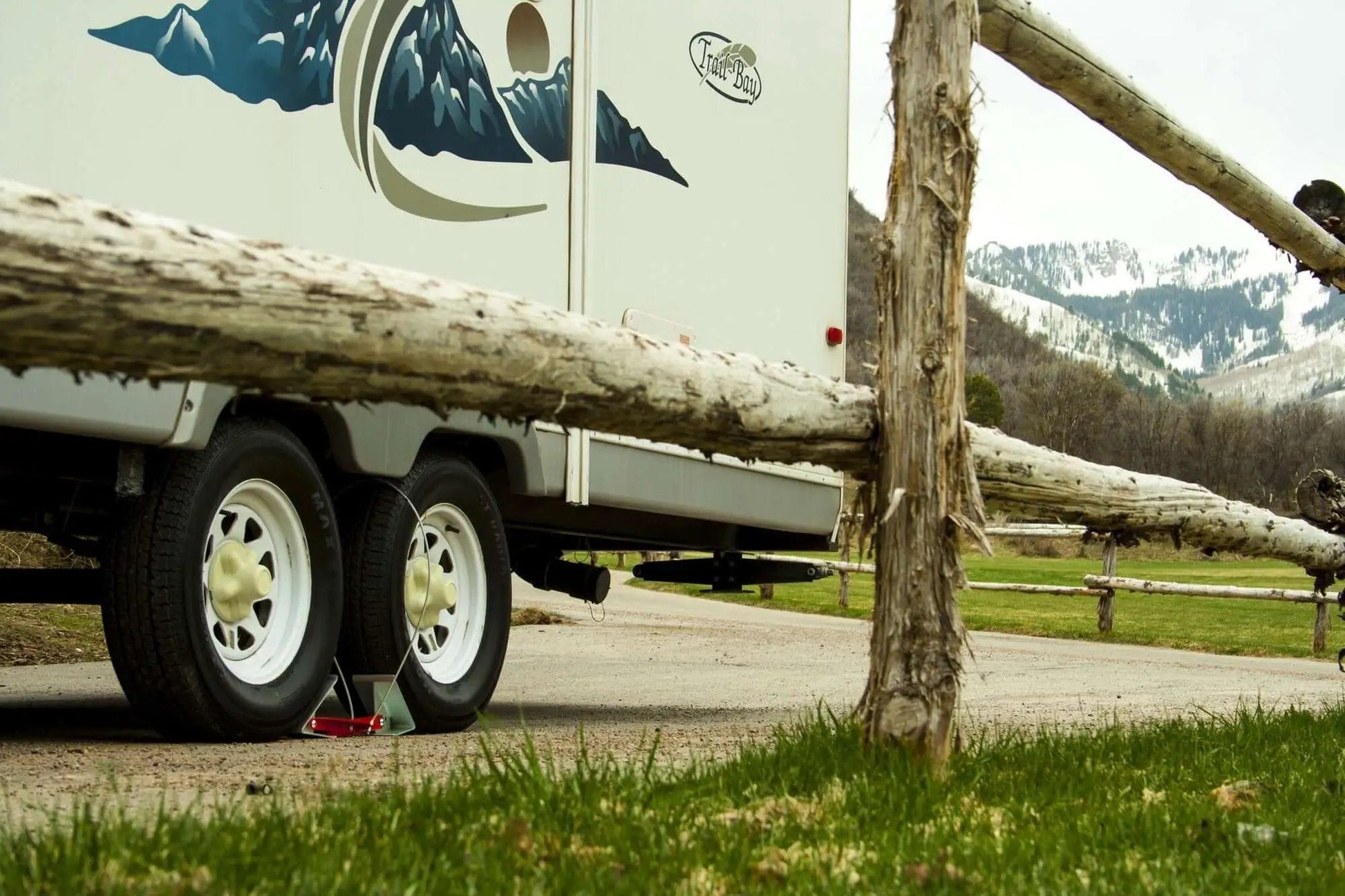OneStep Wheel Chock Double Pack For Tandem Axle Trailers And RVs, 16 To 24 Inch Long, installed under RV wheels for stability