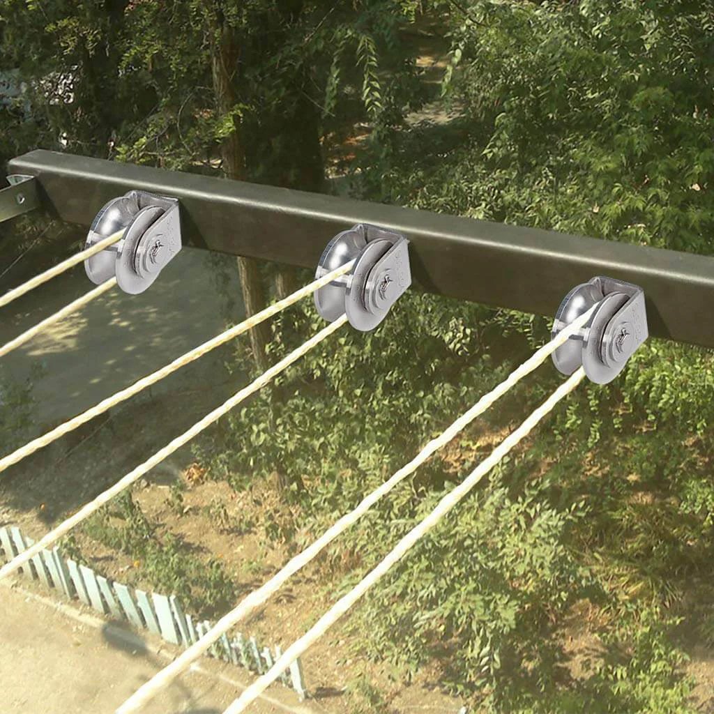 U Groove Pulley Block 2", 304 stainless steel pulley roller installed, showing wire rope traction setup outdoors on beam
