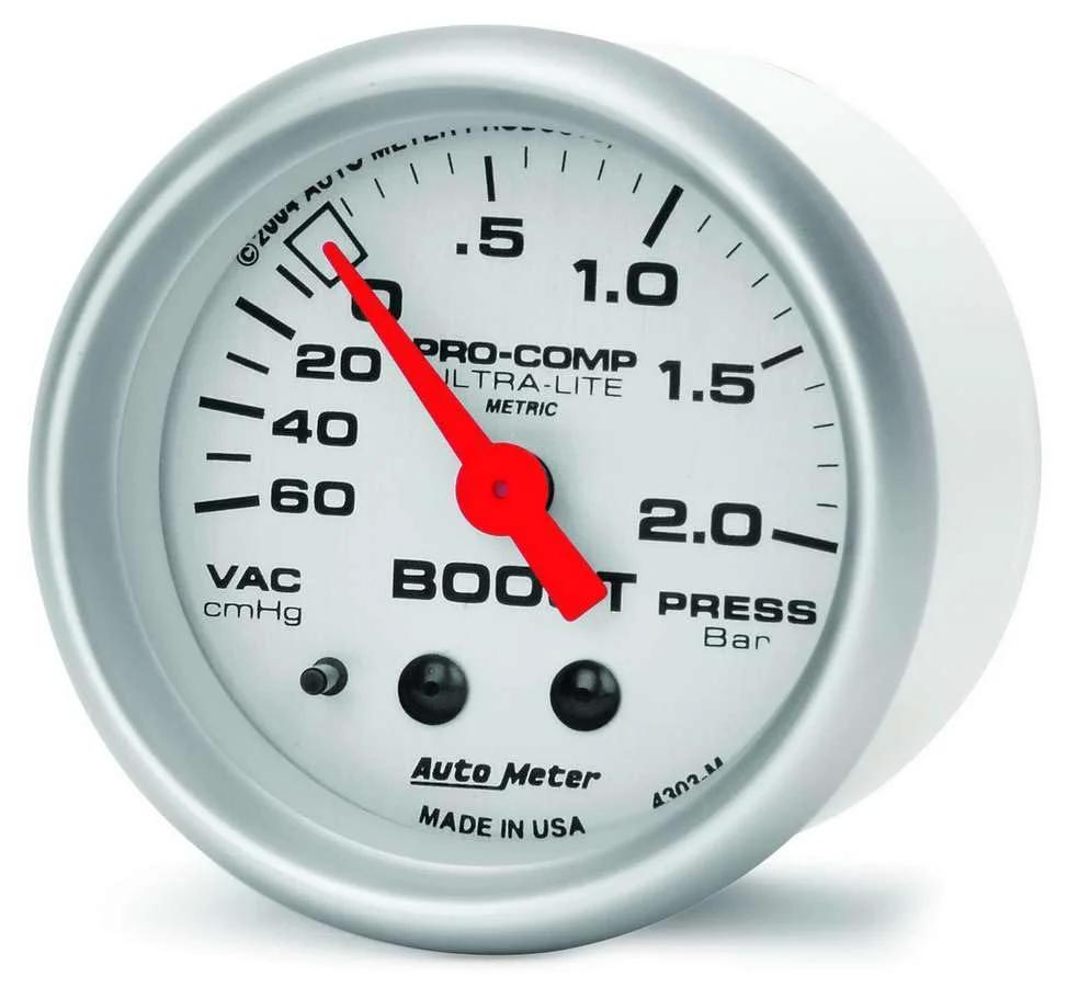 Ultra Lite Mechanical Boost And Vacuum Gauge 2.3125 Inch Dial With Perimeter Incandescent Lighting No Electrical System Required Race Proven Accuracy Easy Install For Street And Track Vehicles Auto Meter 4303 close-up view showing gauge face and dial
