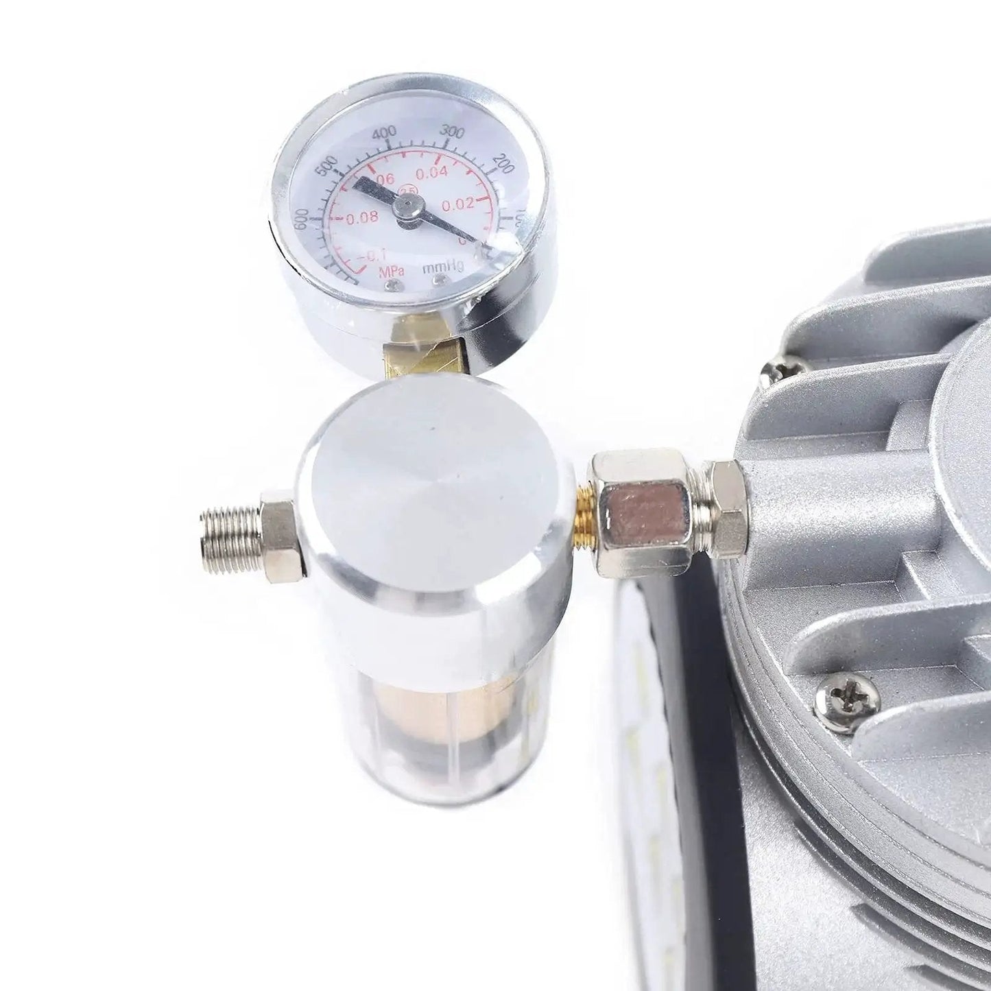 Close-up of the Oil Free Diaphragm Vacuum Pump For Food Packaging And Handicrafts with gauge and fittings, durable and portable.