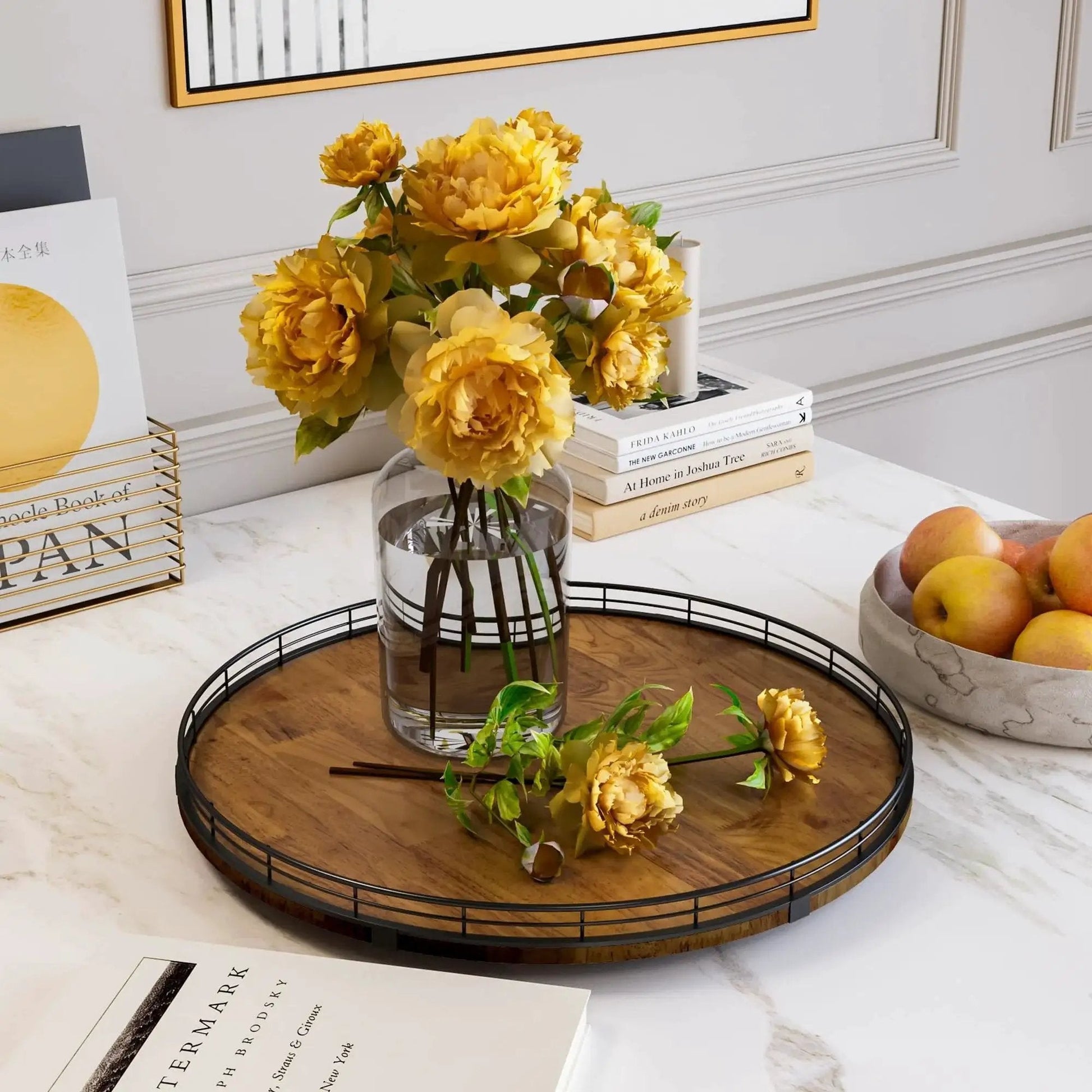 Walnut Wood 18 Inch Lazy Susan Turntable Organizer on a countertop with vase of yellow flowers, books, and a bowl of apples
