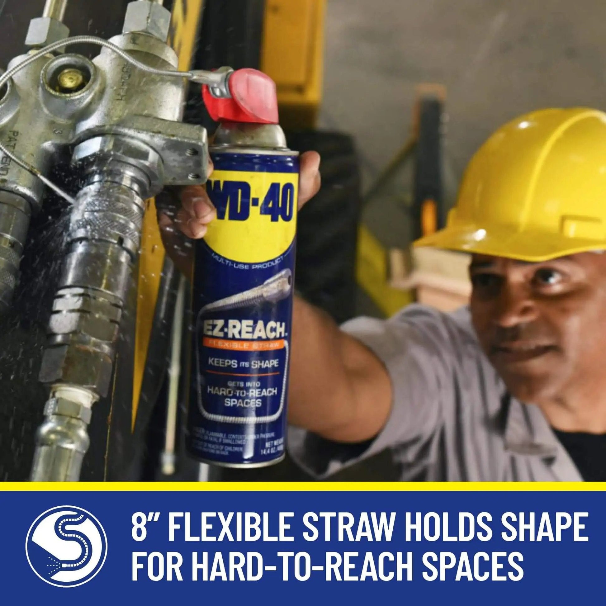 Worker using EZ Reach Flexible Straw Multi Use Lubricant For Tight Spaces By WD-40 14.4 oz spray can to lubricate equipment