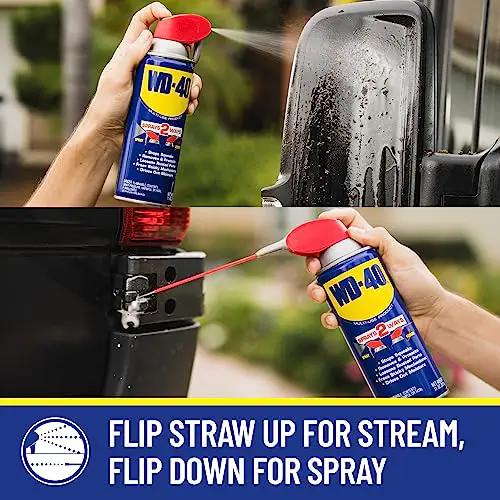 Person using WD-40 Classic Formula 12 oz can on car parts, demonstrating flip straw feature. All Purpose Lubricant That Drives Out Moisture and Fights Rust, Protects Metal From Corrosion, Frees Grease and Grime, Great for Tools, Cars, Electronics, and More, WD-40 Classic Formula 12 Pack 12 Oz Cans.