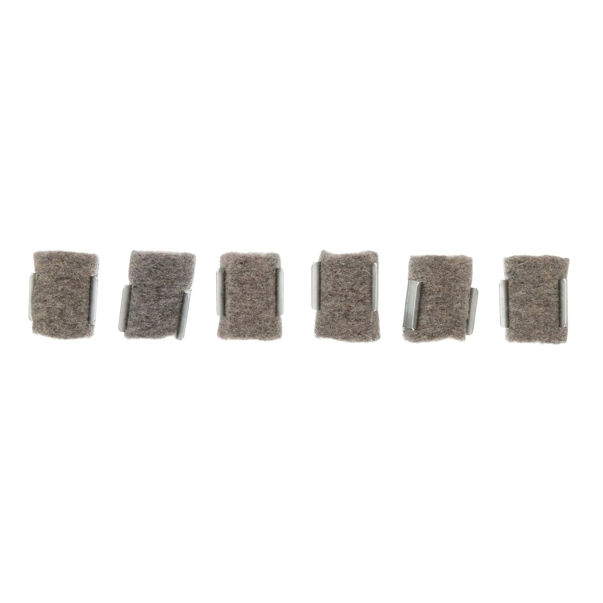 Pack of six Lube-Matic Pre-Treated Lube Pads for welding wire feeding, black finish, aligned for display on a white background.