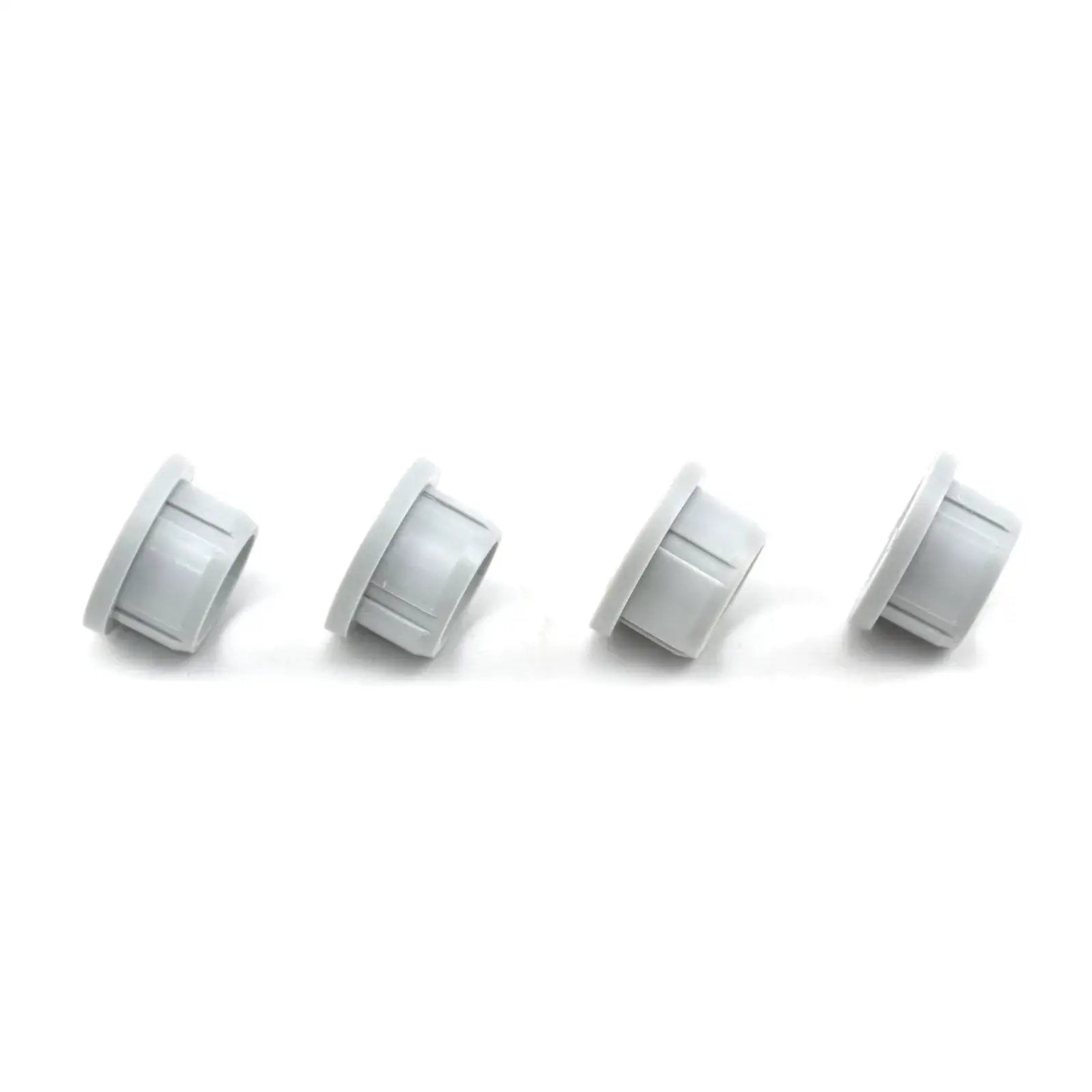 Set of four wheel bushings for 38/42/46 inch lawn sweepers, shown in white plastic. Wheel Bushing Replacement Kit For 38 Inch 42 Inch And 46 Inch Lawn Sweepers Fits Agri Fab And Craftsman 4 Pack Premium Durable Replacement Parts For Easy Installation Restores Smooth Operation And Extends Wheel Life.