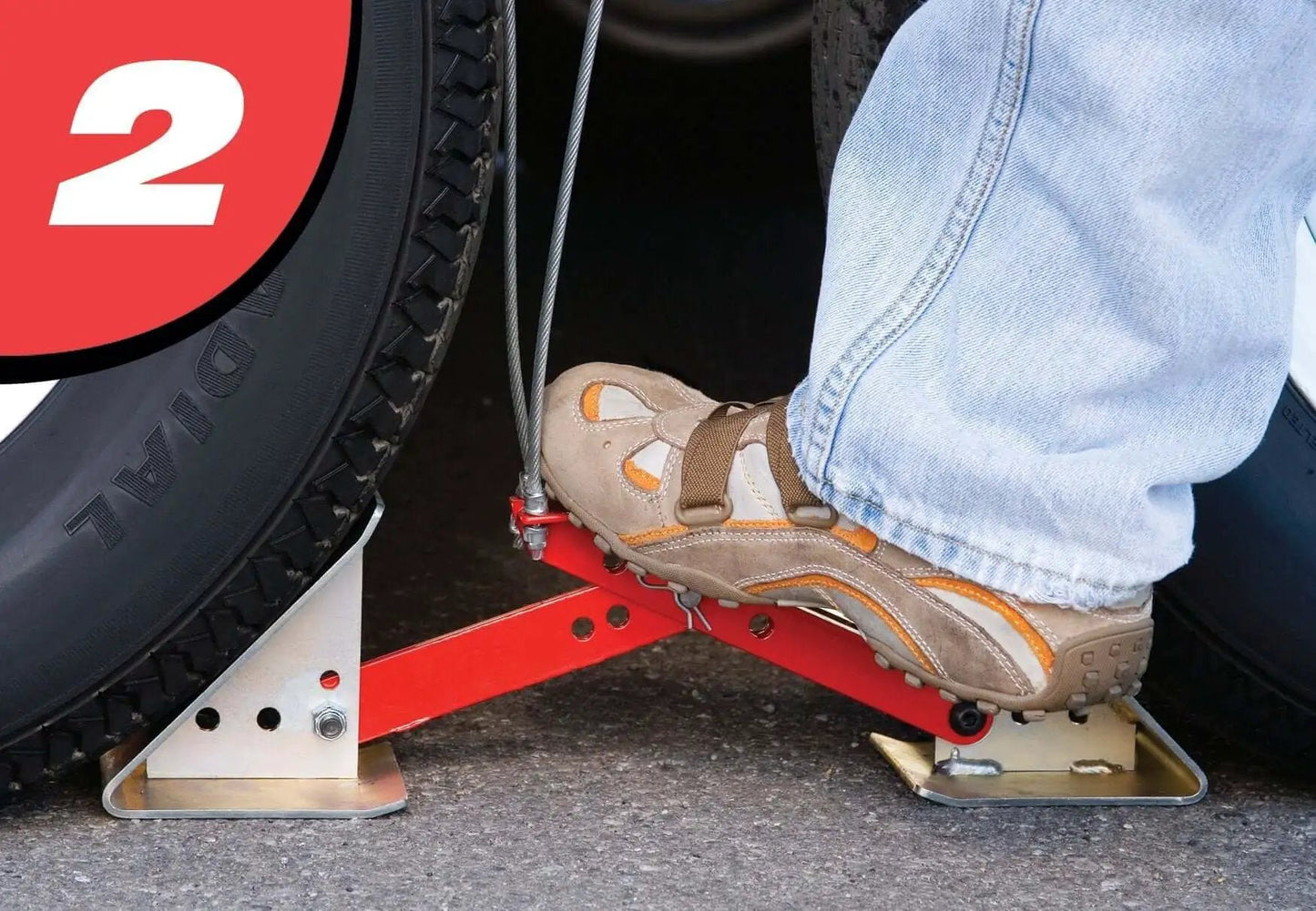 Foot installing OneStep Wheel Chock Double Pack For Tandem Axle Trailers And RVs, 16 to 24 Inch Long, no kneeling required